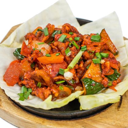 Chilli squid with tomatoes